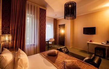 Фото номера Двухместный номер бизнес-класса с 1 кроватью Отель Weekend Boutique Hotel г. Кишинёв 27