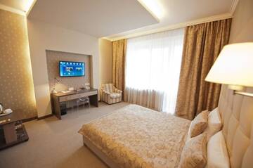 Фото номера Двухместный номер Делюкс с 1 кроватью Отель Jolly Alon Hotel г. Кишинёв 11