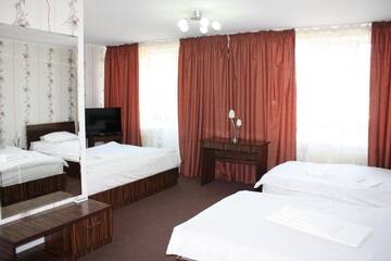 Фото номера Стандартный трехместный номер Отель Europa Hotel г. Кишинёв 3