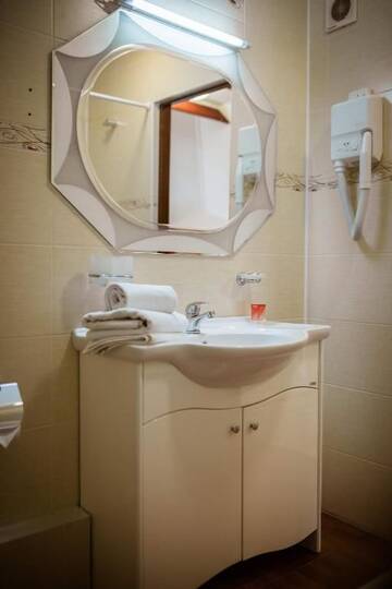 Фото номера Стандартный двухместный номер с 1 кроватью Отель Vila Muntenia Hotel г. Кишинёв 10