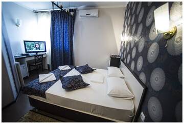 Фото номера Стандартный одноместный номер Отель Iris Hotel г. Кишинёв 3