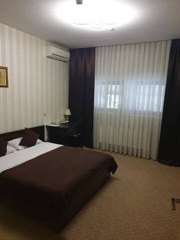 Фото номера Двухместный номер «Комфорт» с 1 кроватью Отель TipTop Hotel г. Кишинёв 2
