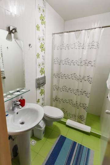 Фото номера Двухместный номер «Комфорт» с 1 кроватью Отель TipTop Hotel г. Кишинёв 5