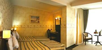 Фото номера Стандартный двухместный номер с 2 отдельными кроватями Отель President Resort Hotel г. Кишинёв 4