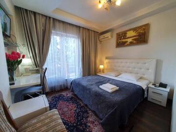 Фото номера Двухместный номер с 1 кроватью и балконом Отель Bella Donna Hotel г. Кишинёв 6