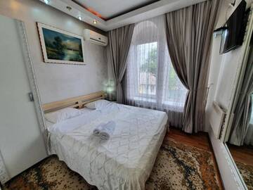 Фото номера Двухместный номер с 2 отдельными кроватями Отель Bella Donna Hotel г. Кишинёв 4