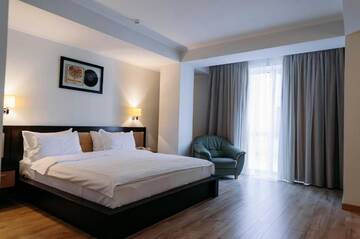 Фото номера Улучшенный двухместный номер с 1 кроватью Отель Jazz Hotel г. Кишинёв 6