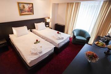 Фото номера Улучшенный двухместный номер с 1 кроватью Отель Jazz Hotel г. Кишинёв 13