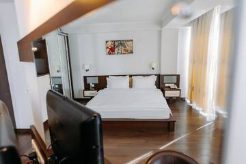 Фото номера Двухместный номер Делюкс с 1 кроватью Отель Jazz Hotel г. Кишинёв 2
