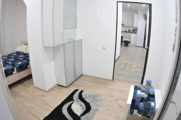 Фото номера Апартаменты с 2 спальнями Апартаменты Main Street Apartments г. Кишинёв 9