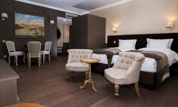 Фото номера Улучшенные апартаменты Отель ZENTRUM Hotel г. Кишинёв 10