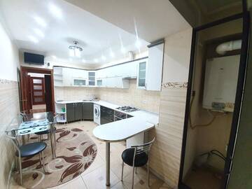 Фото номера Апартаменты с 2 спальнями Апартаменты Lux Apartments 2-rooms new Building in the center Chisinau г. Кишинёв 15