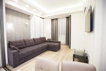 Фото номера Улучшенные апартаменты Апартаменты Main Street Sky House Apartments г. Кишинёв 9