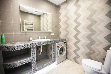 Фото номера Апартаменты Апартаменты Main Street Sky House Apartments г. Кишинёв 32
