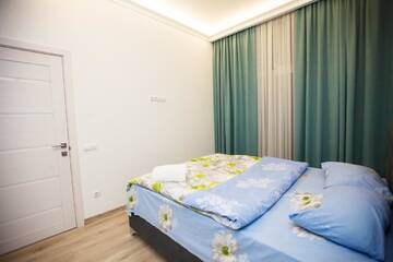 Фото номера Улучшенные апартаменты Апартаменты Main Street Sky House Apartments г. Кишинёв 4