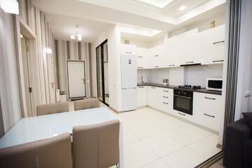 Фото номера Улучшенные апартаменты Апартаменты Main Street Sky House Apartments г. Кишинёв 6