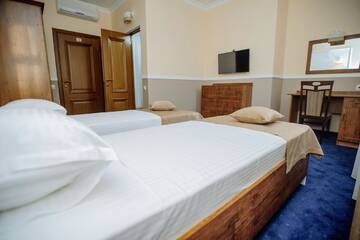 Фото номера Двухместный номер с 2 отдельными кроватями Отель Astoria г. Кишинёв 6