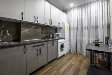 Фото номера Апартаменты с 1 спальней Апартаменты Apartment in the center! PANORAMIC WINDOWS! Fireplace! г. Кишинёв 7