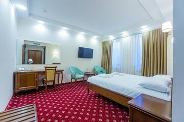 Фото номера Большой двухместный номер с 1 кроватью Отель Ambassador Hotel г. Кишинёв 11
