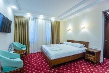 Фото номера Большой двухместный номер с 1 кроватью Отель Ambassador Hotel г. Кишинёв 12