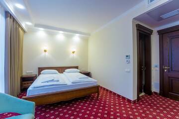 Фото номера Большой двухместный номер с 1 кроватью Отель Ambassador Hotel г. Кишинёв 13