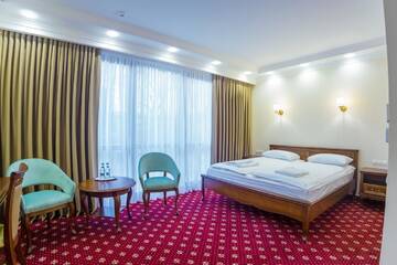 Фото номера Большой двухместный номер с 1 кроватью Отель Ambassador Hotel г. Кишинёв 6