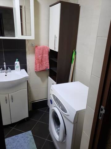 Фото номера Апартаменты с 2 спальнями Апартаменты apartament 3 cameri centru chisinau г. Кишинёв 9