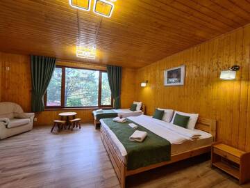 Фото номера Улучшенный трехместный номер Отель Sky Land Camping &amp; Resort г. Кишинёв 4